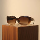 GUCCI Crescent Glow Polarized Shades – Premium UV Protection Sunglasses | Optical Plaza