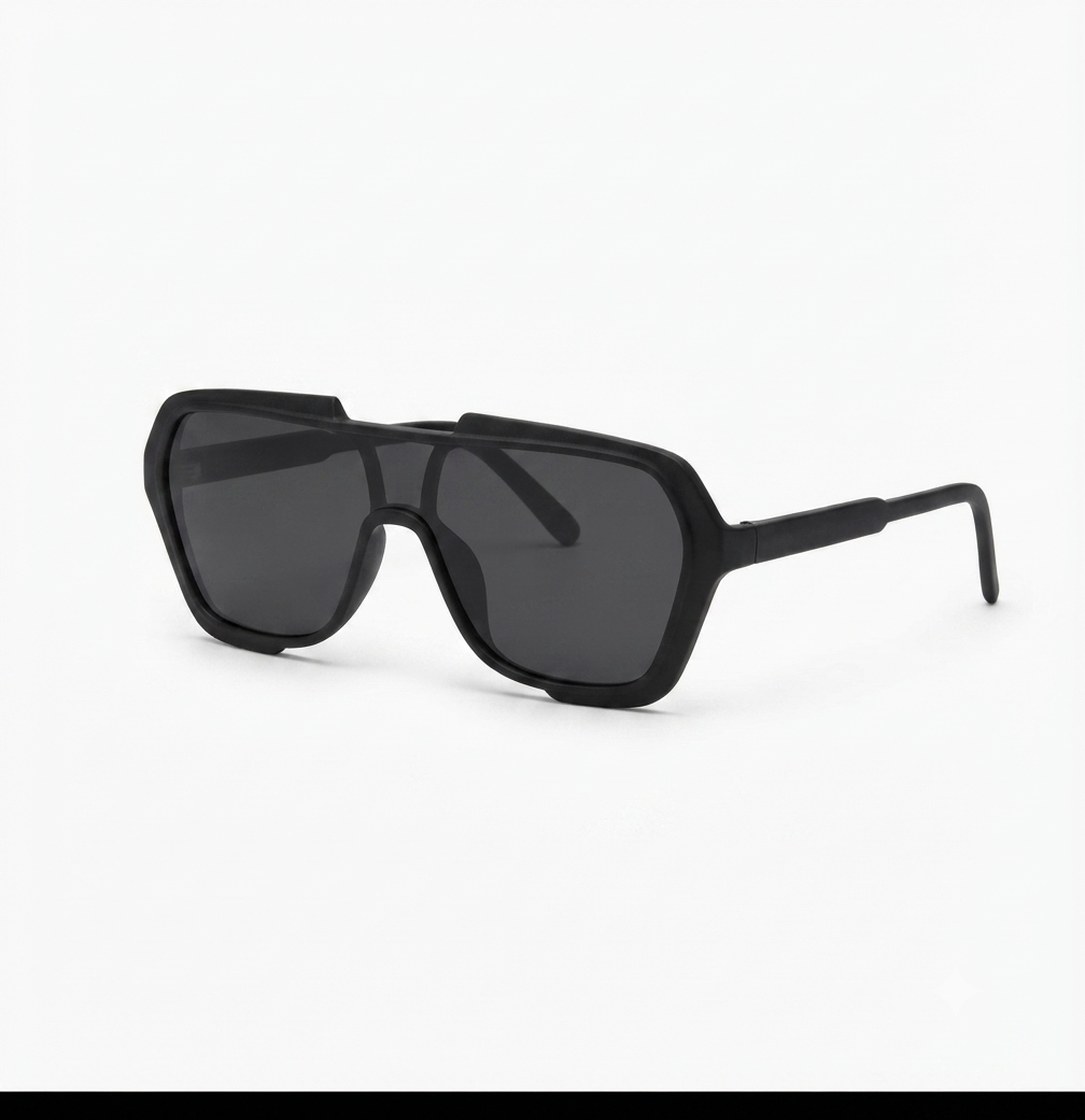 Front view of premium matte black shield sunglasses with an oversized one-piece lens on a white background.