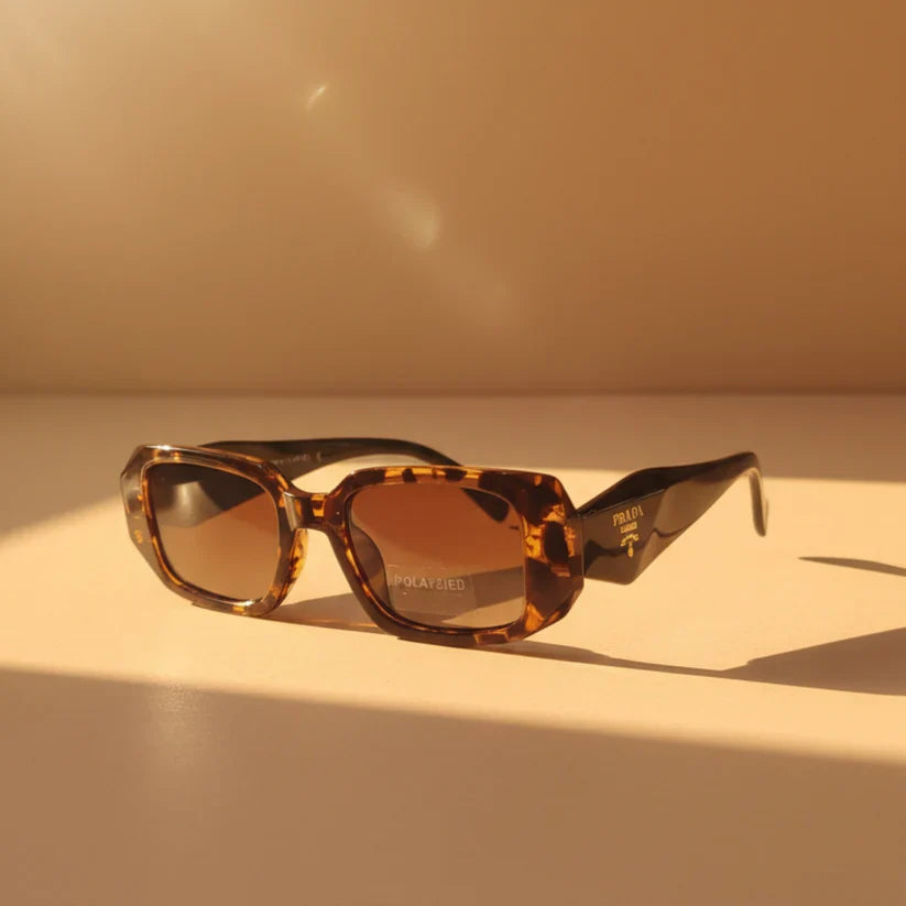 PRADA CrystalCut Polarized Luxury Sunglasses – Premium UV Protection | Optical Plaza
