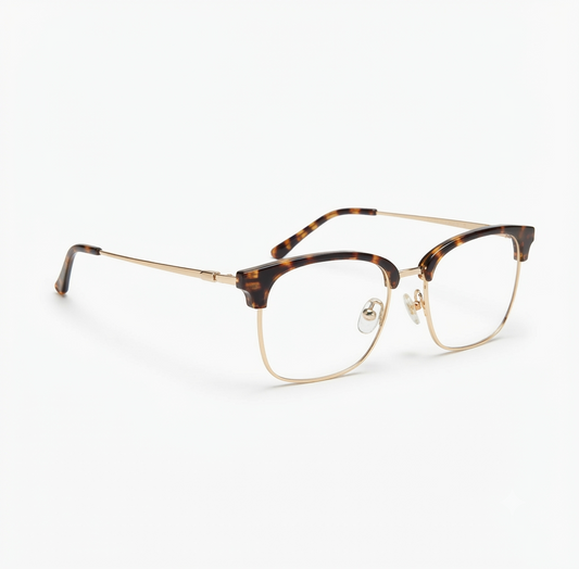 Front view of Club Masters eyeglasses with a tortoiseshell upper frame and gold metal rim.
