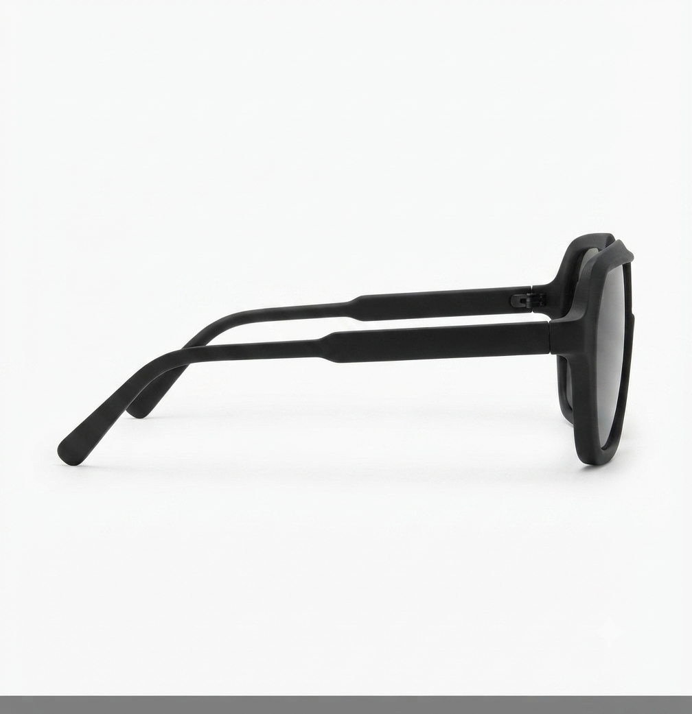 Side profile of premium matte black shield sunglasses highlighting the frame and temple design.