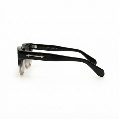 Close-up of MOSCOT designer sunglasses highlighting the frame and temple details.