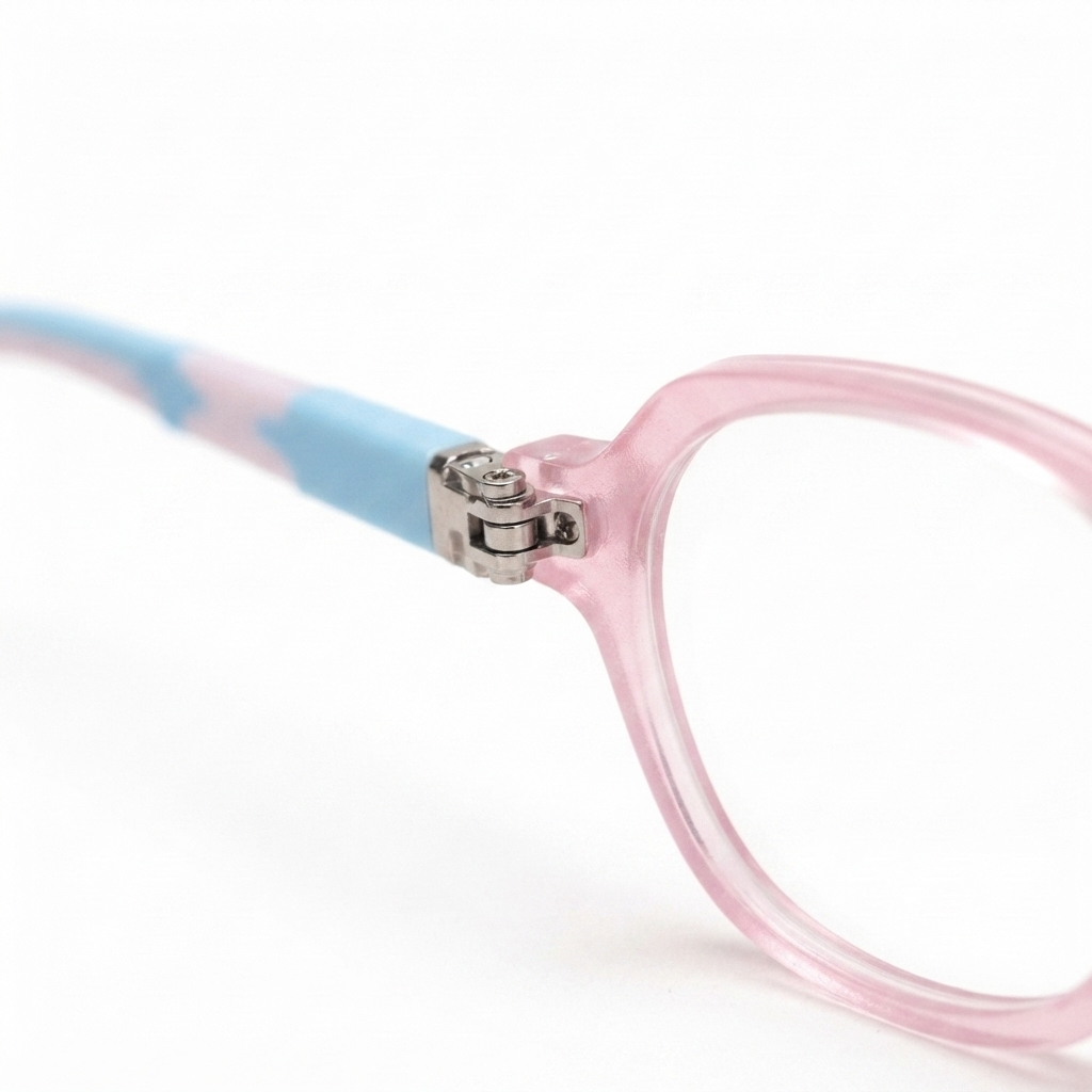 Front view of a round-square kids' spectacle frame in pink and blue.